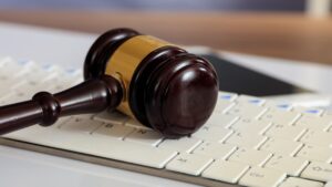 Auction Or Judge Gavel On A Computer Keyboard