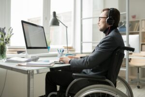 Busy Businessman In Wheelchair